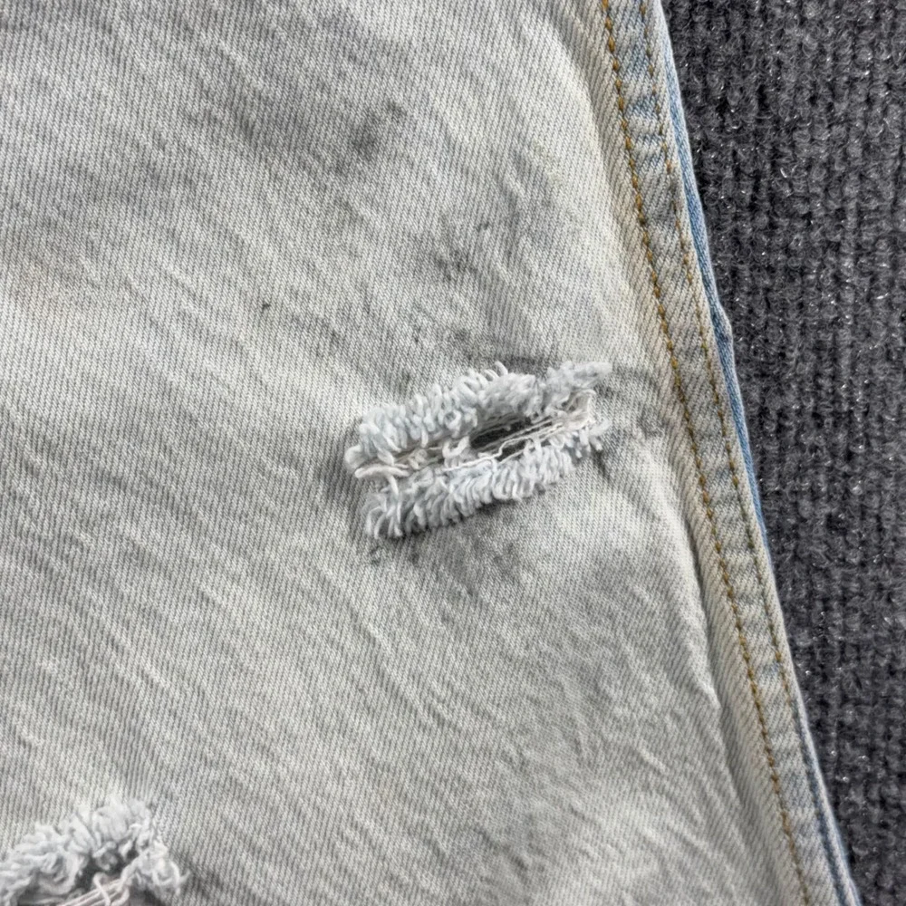 Levis 537 Jeans Mens 32x30 Western Bootcut Distressed Frayed Hem Light Rip Wash
